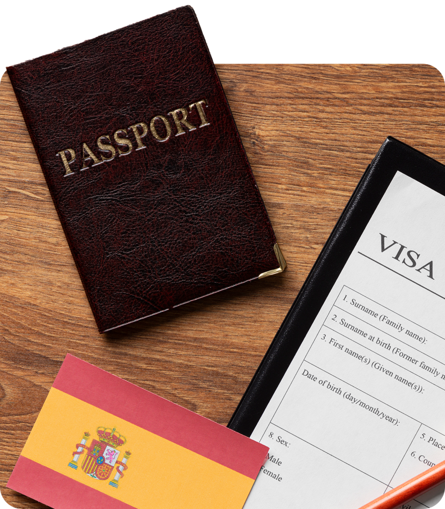 Spanish passport, visa application form, and Spanish flag on wooden desk, representing travel or immigration processes.